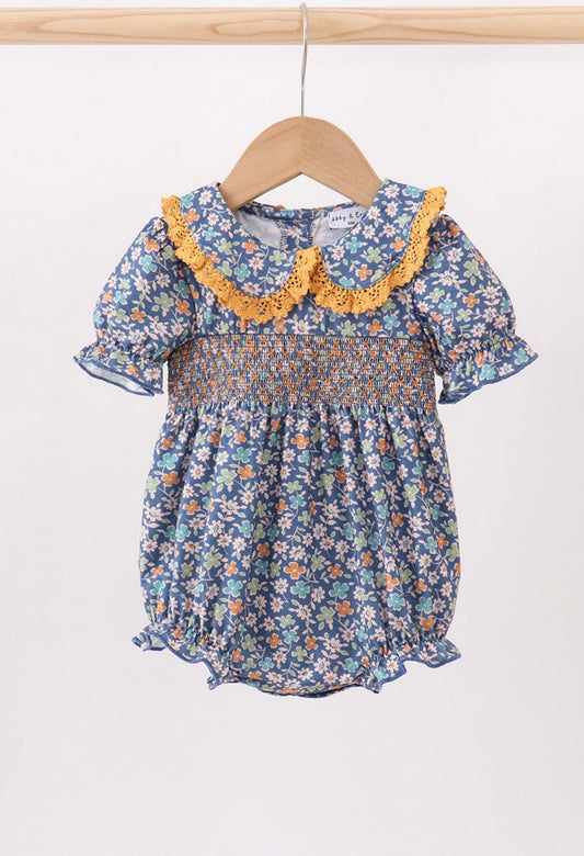 Navy floral smocked ruffle bubble