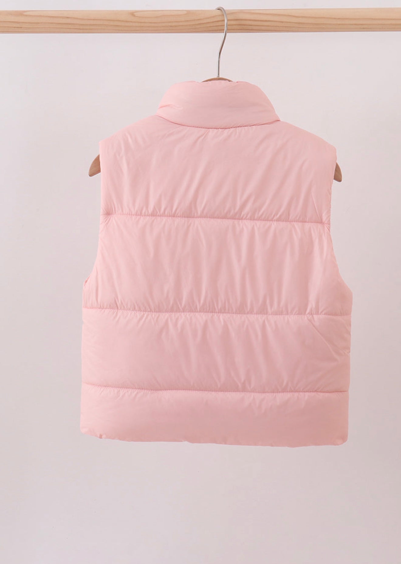 Girl’s pink puffer vest