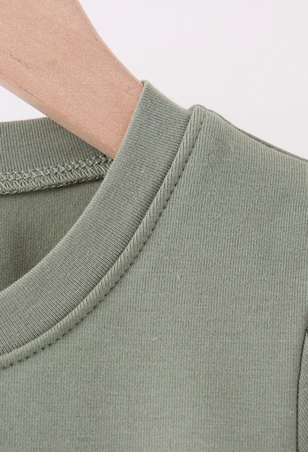 Green pumpkin french knot top