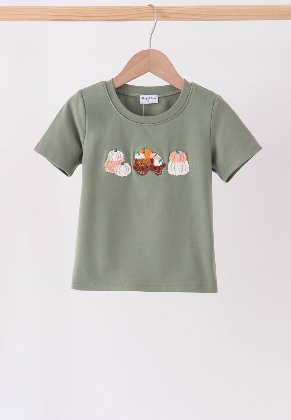 Green pumpkin french knot top
