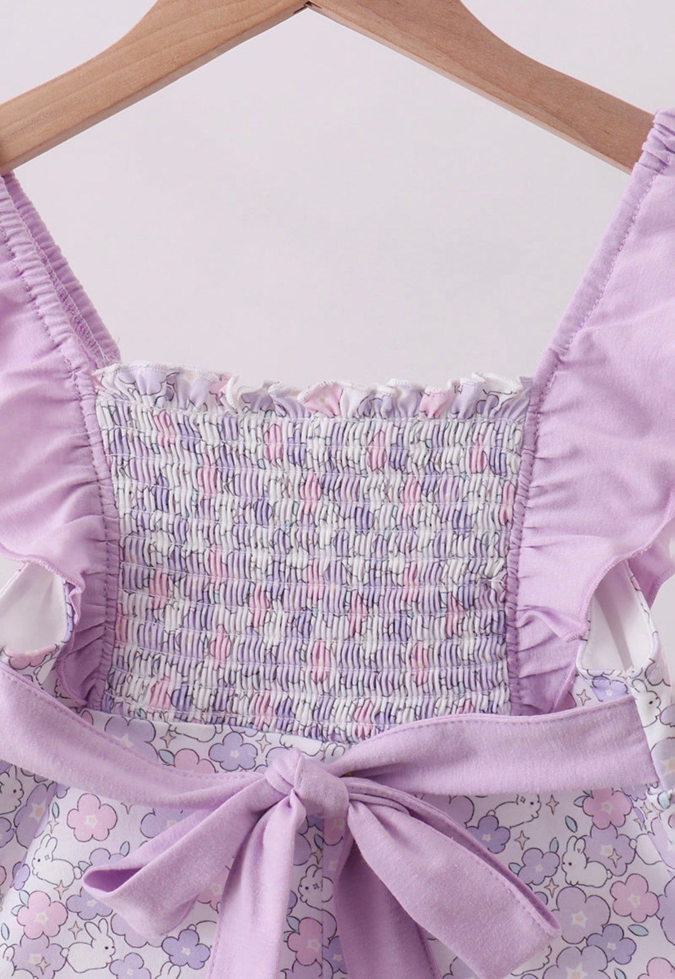 Purple Floral Smocked
Ruffle Jumpsuit