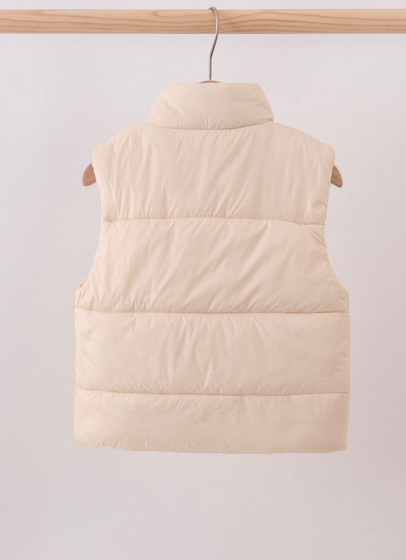 Girl’s cream puffer vest