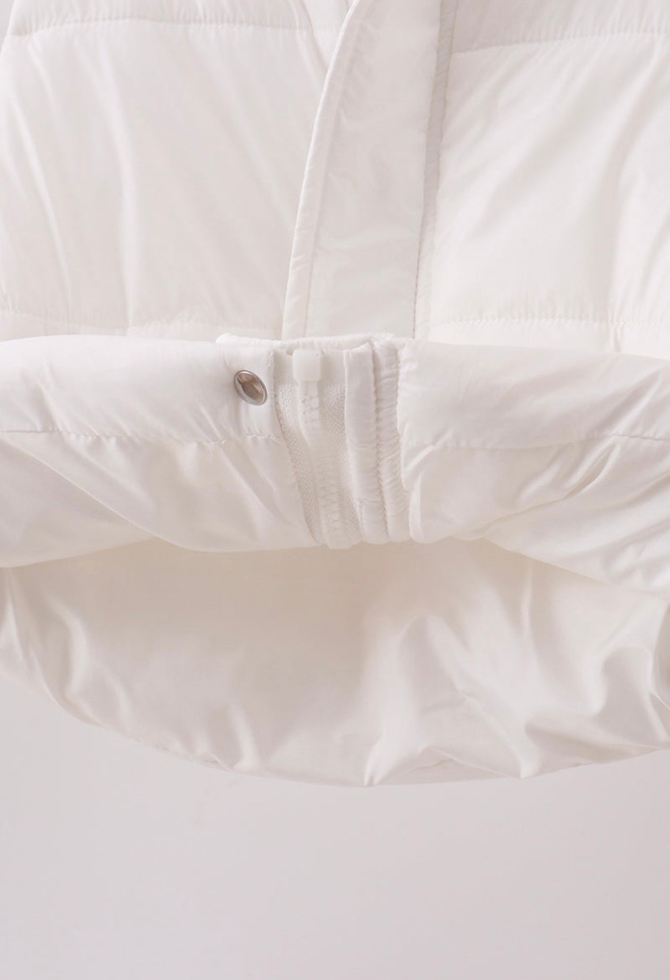 Girl’s white puffer vest