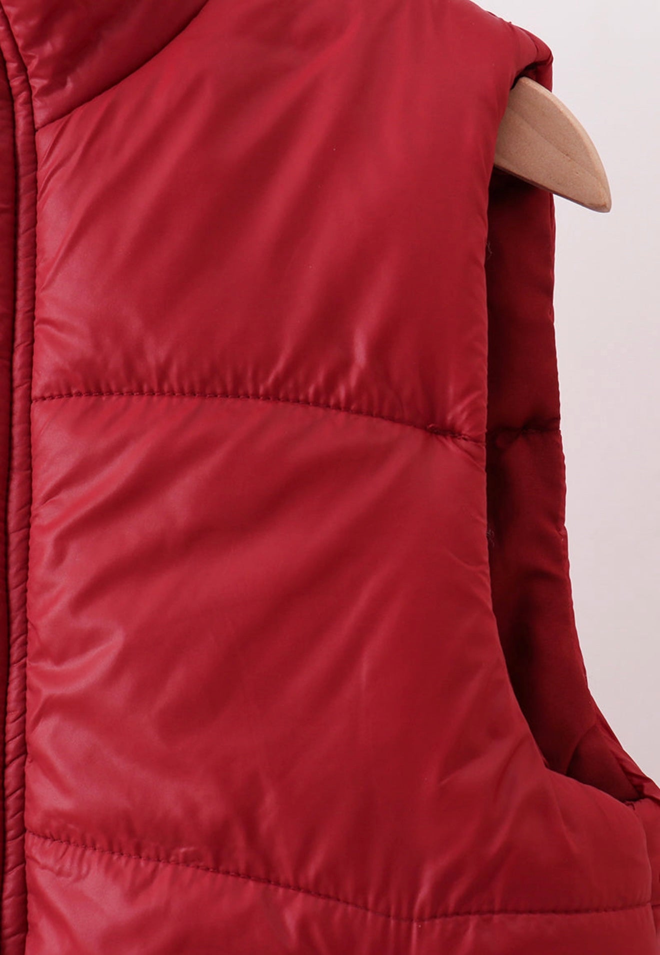 Girl’s maroon puffer vest