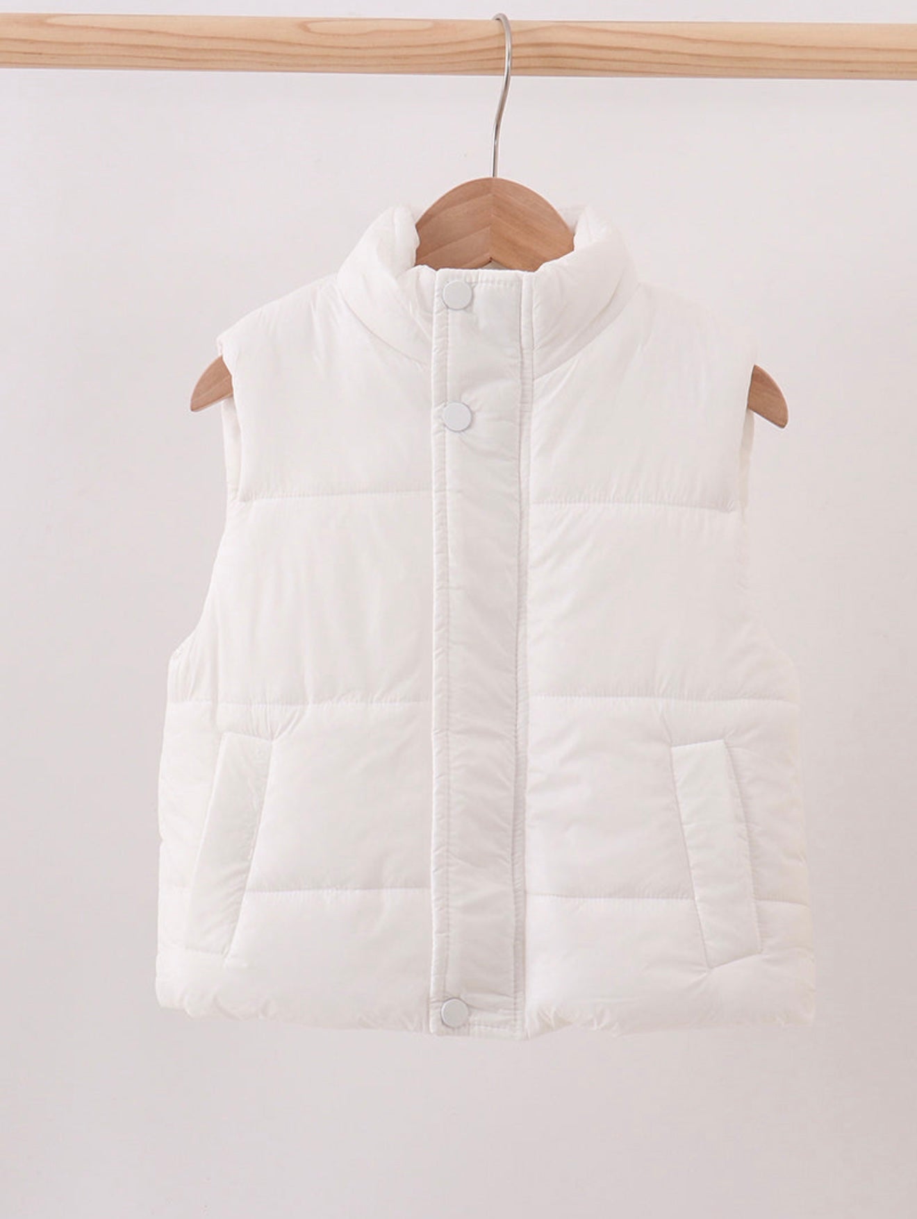 Girl’s white puffer vest