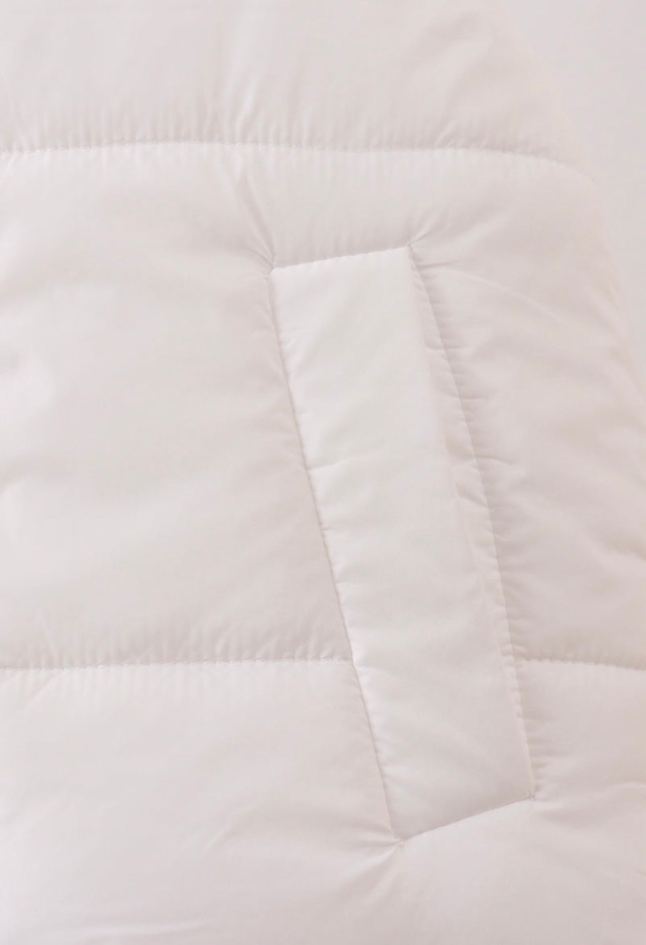 Girl’s white puffer vest