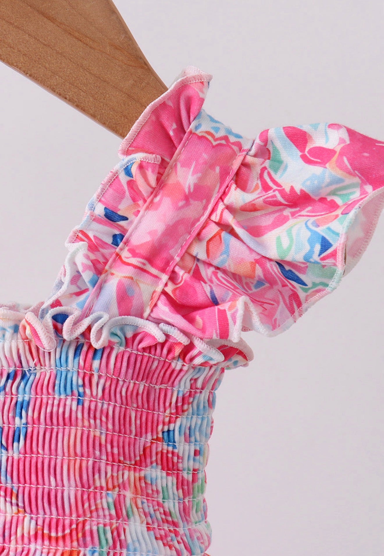 Pink floral smocked ruffle bubble