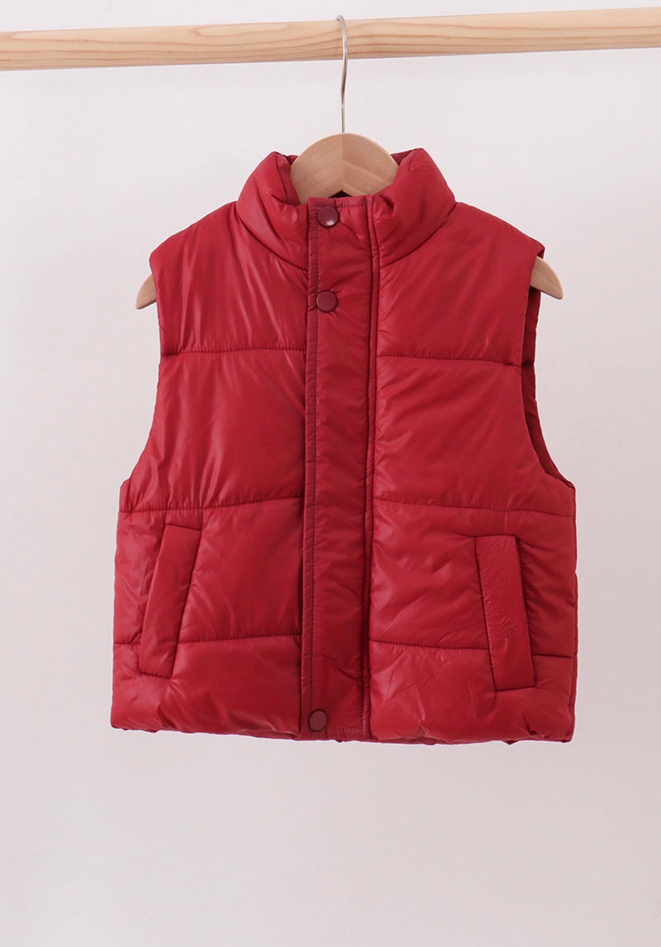 Girl’s maroon puffer vest