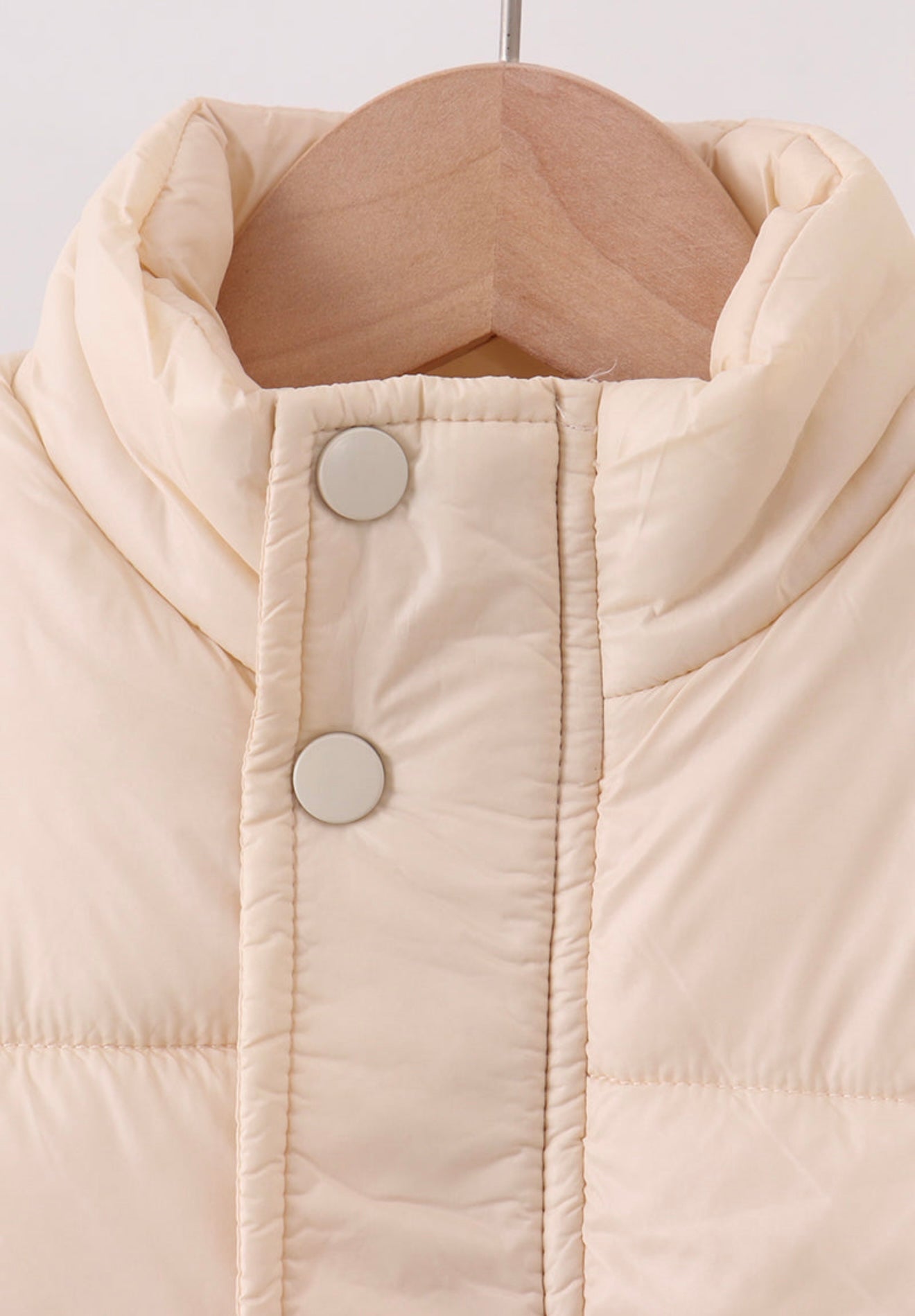 Girl’s cream puffer vest
