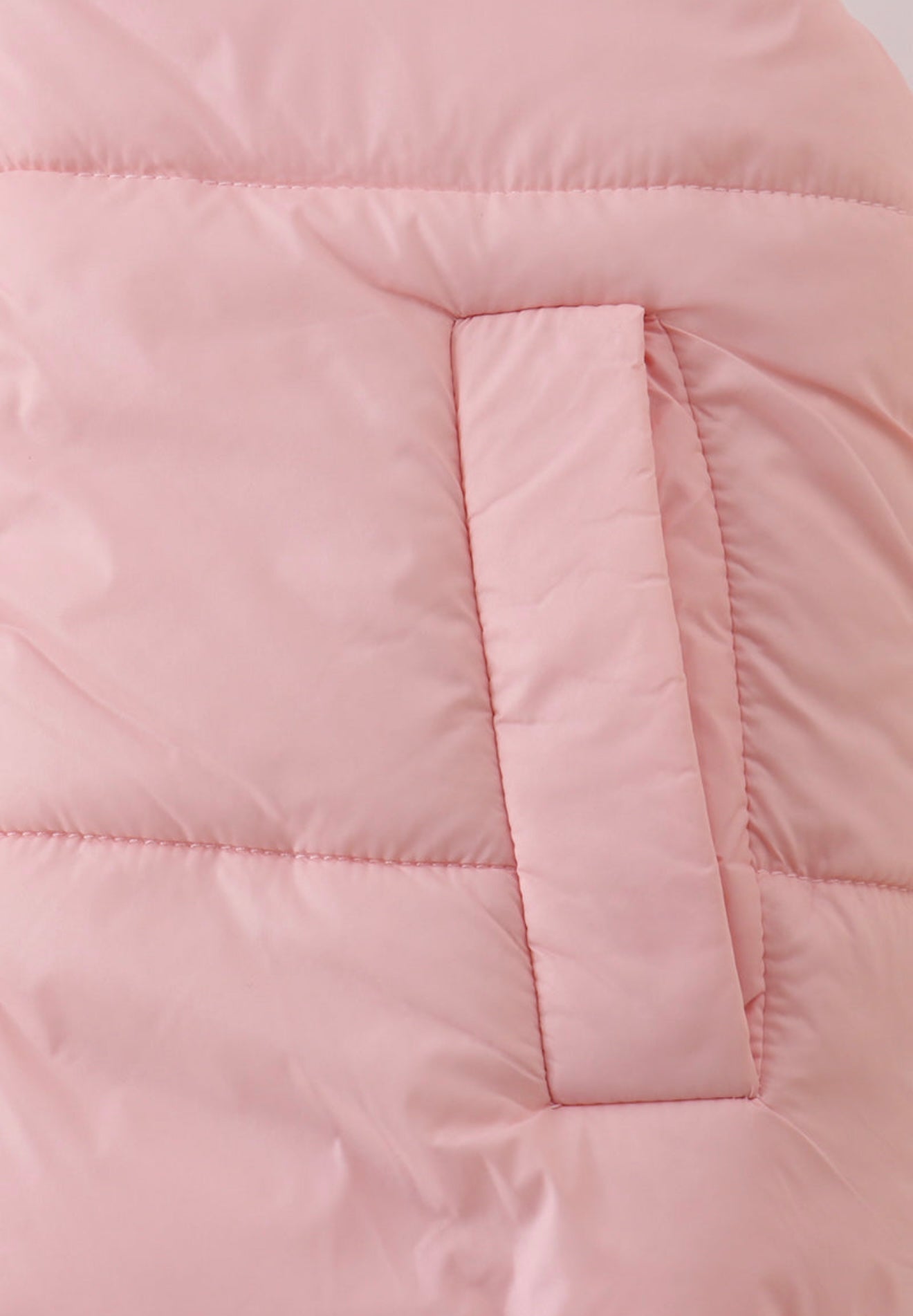 Girl’s pink puffer vest