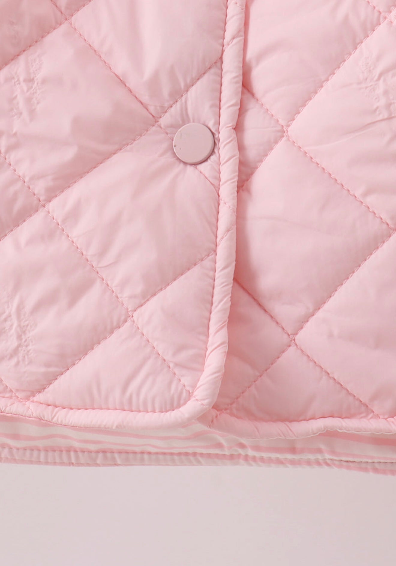 Girl’s pink quilted jacket