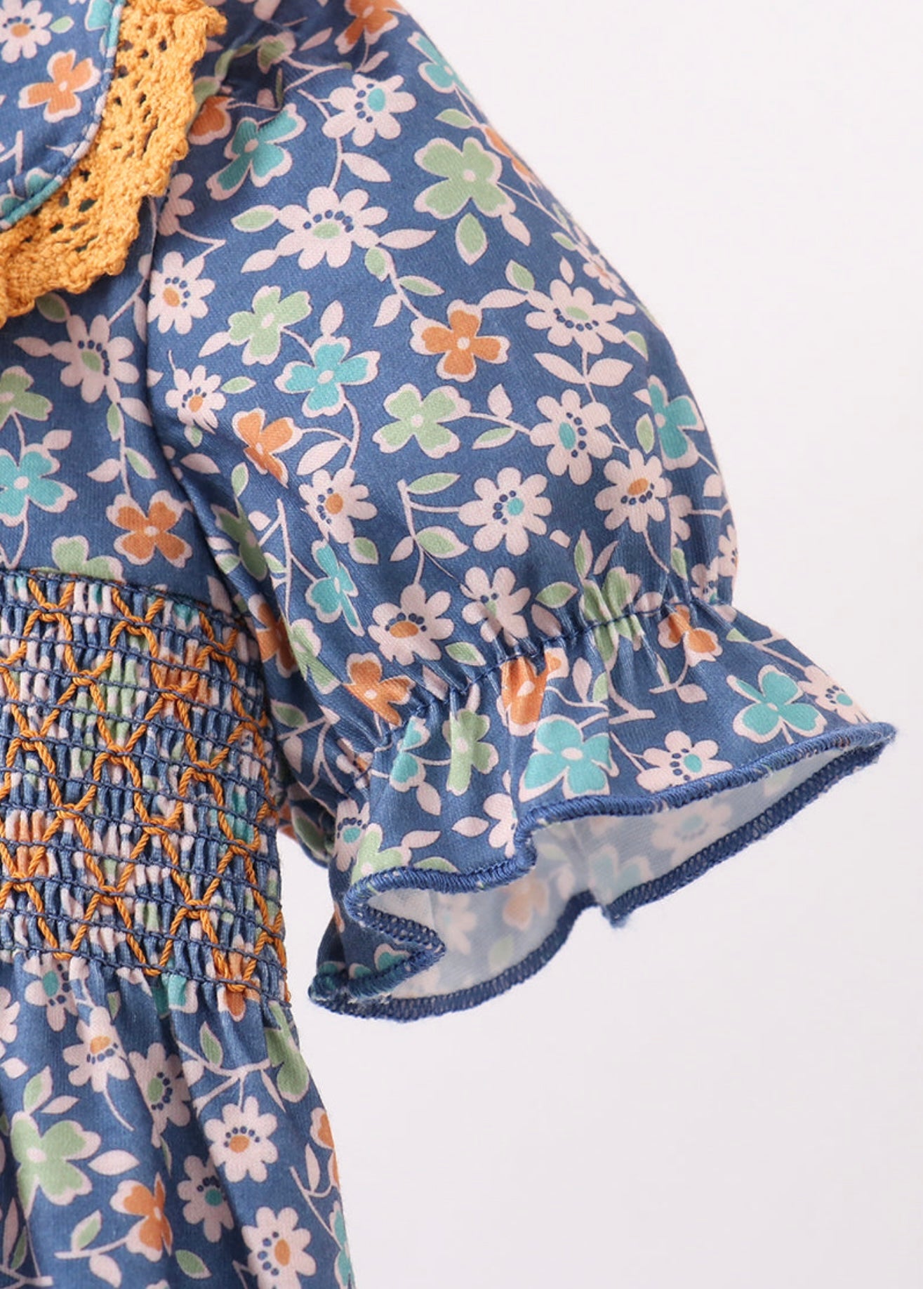 Navy floral smocked ruffle bubble