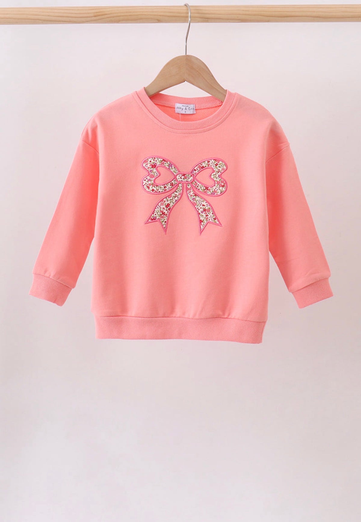Pink Floral Bow Embroidery
Top