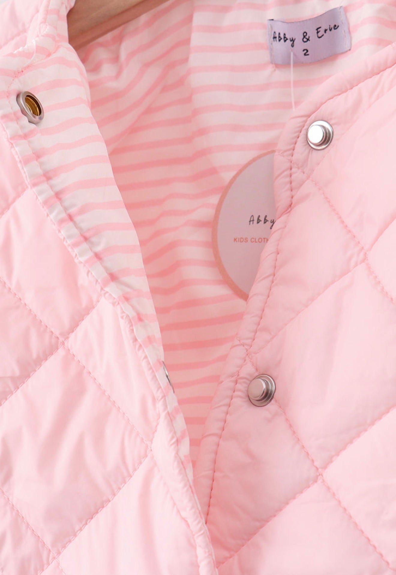 Girl’s pink quilted jacket