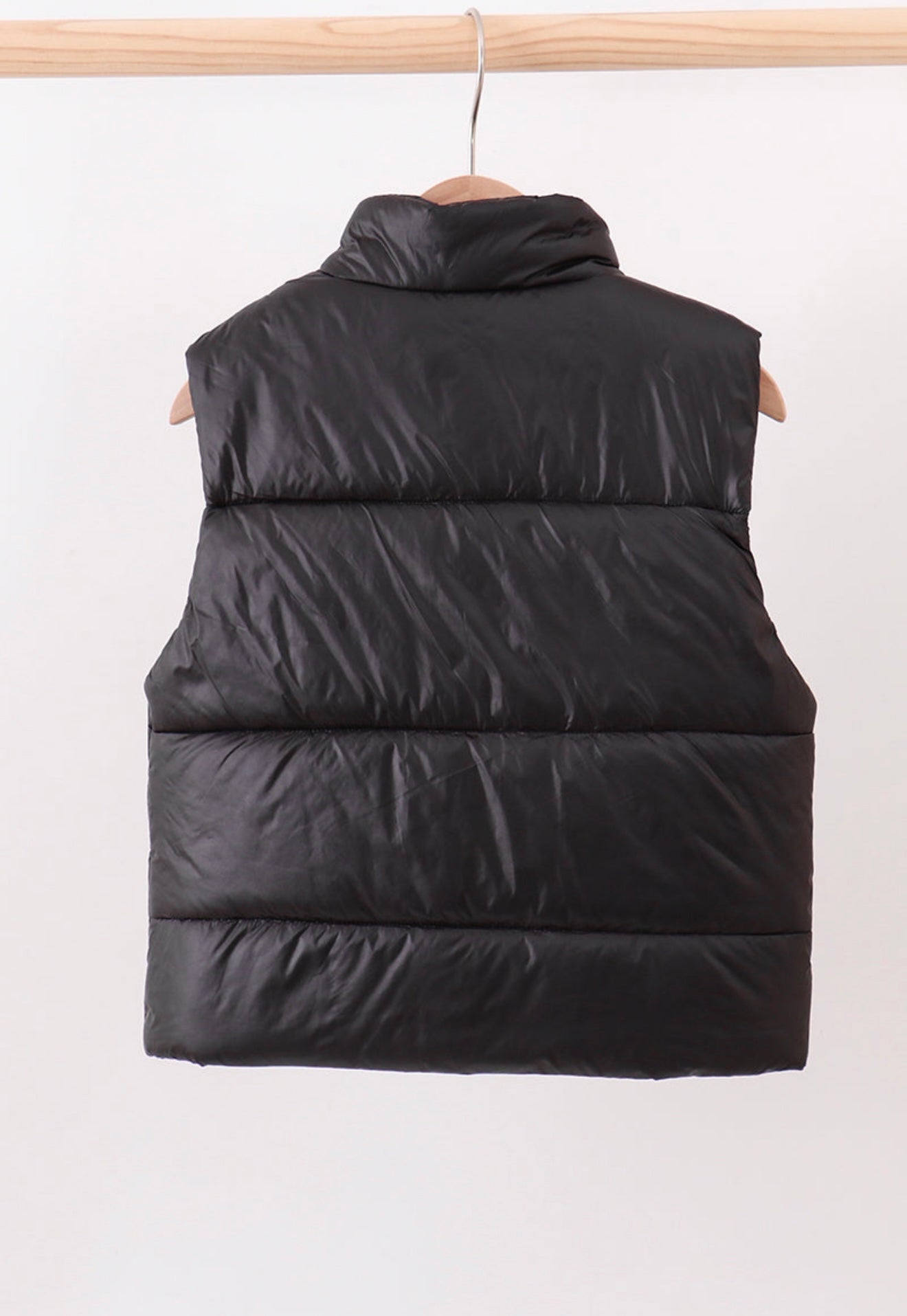 Girl’s black puffer vest