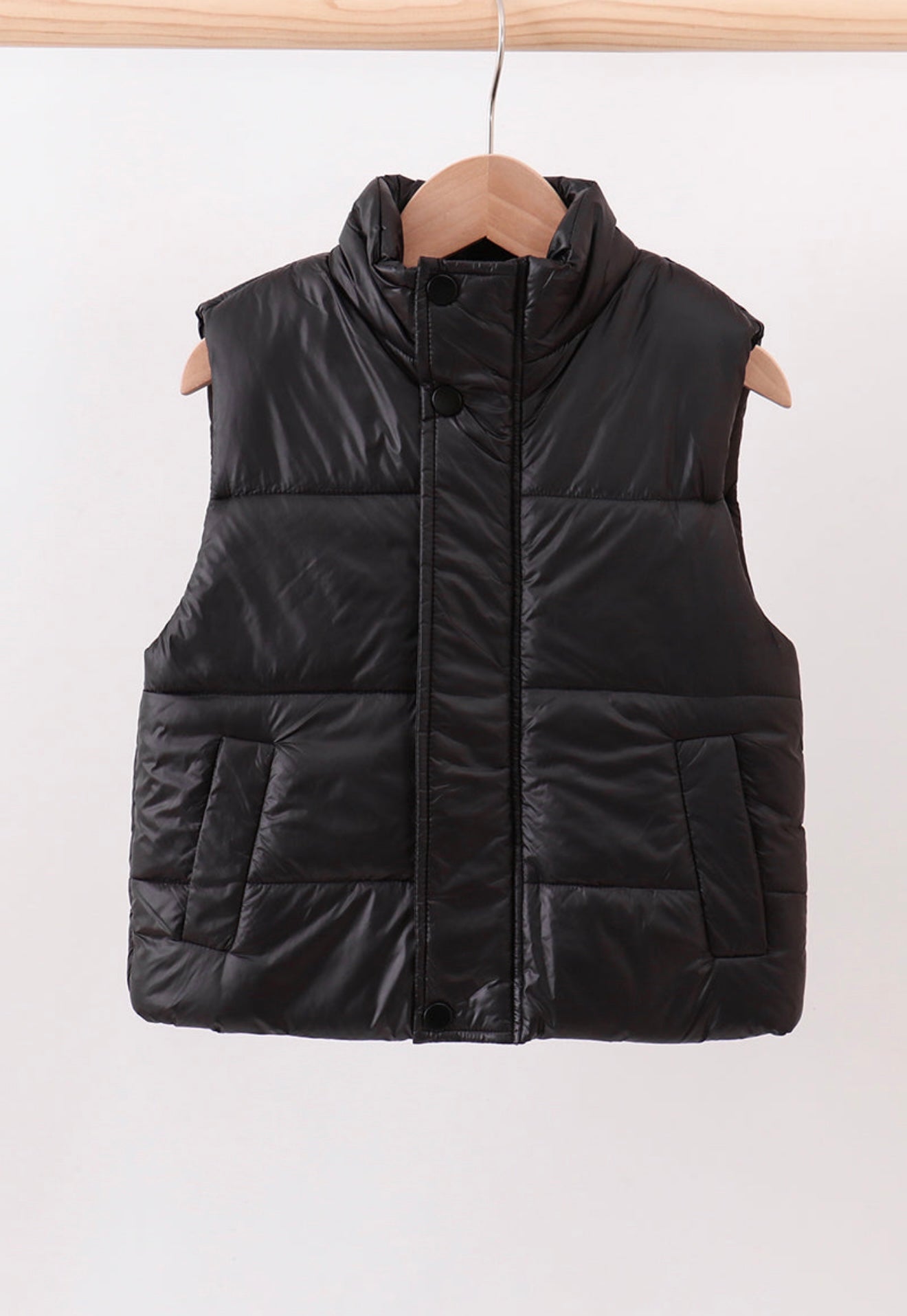 Girl’s black puffer vest