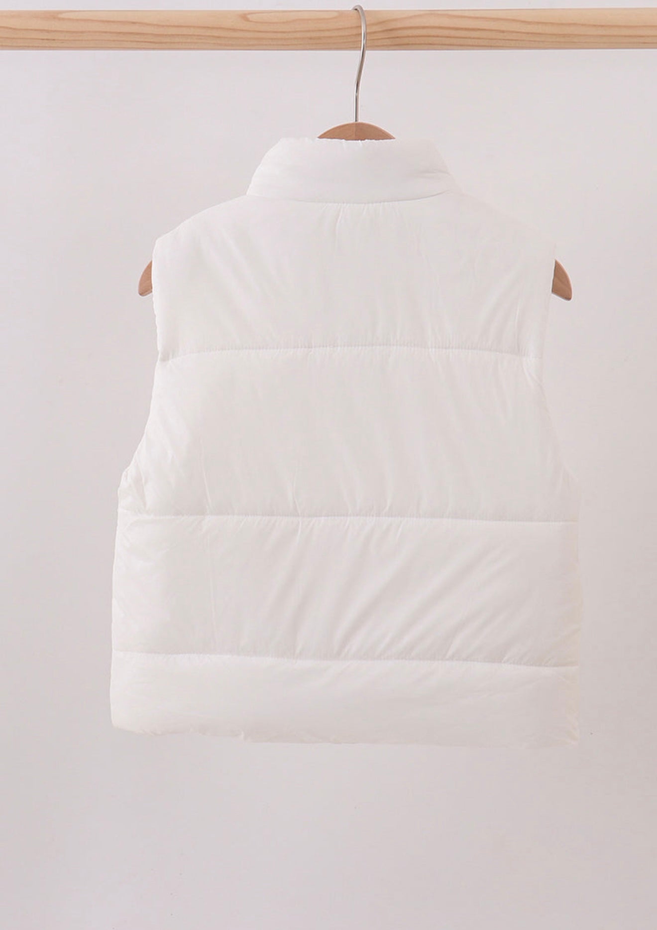 Girl’s white puffer vest