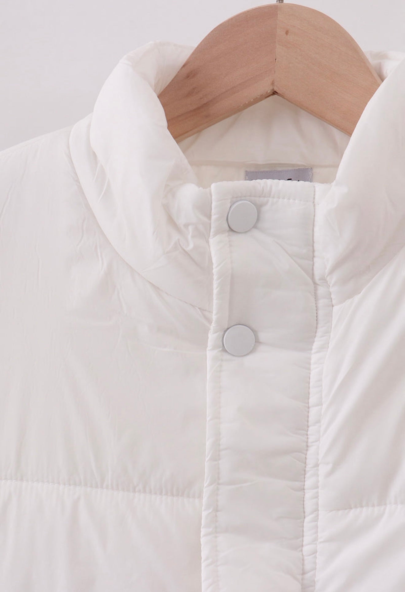 Girl’s white puffer vest