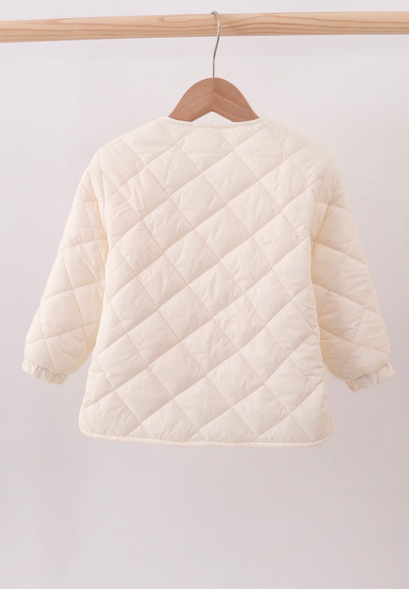 Girl’s cream quilted jacket