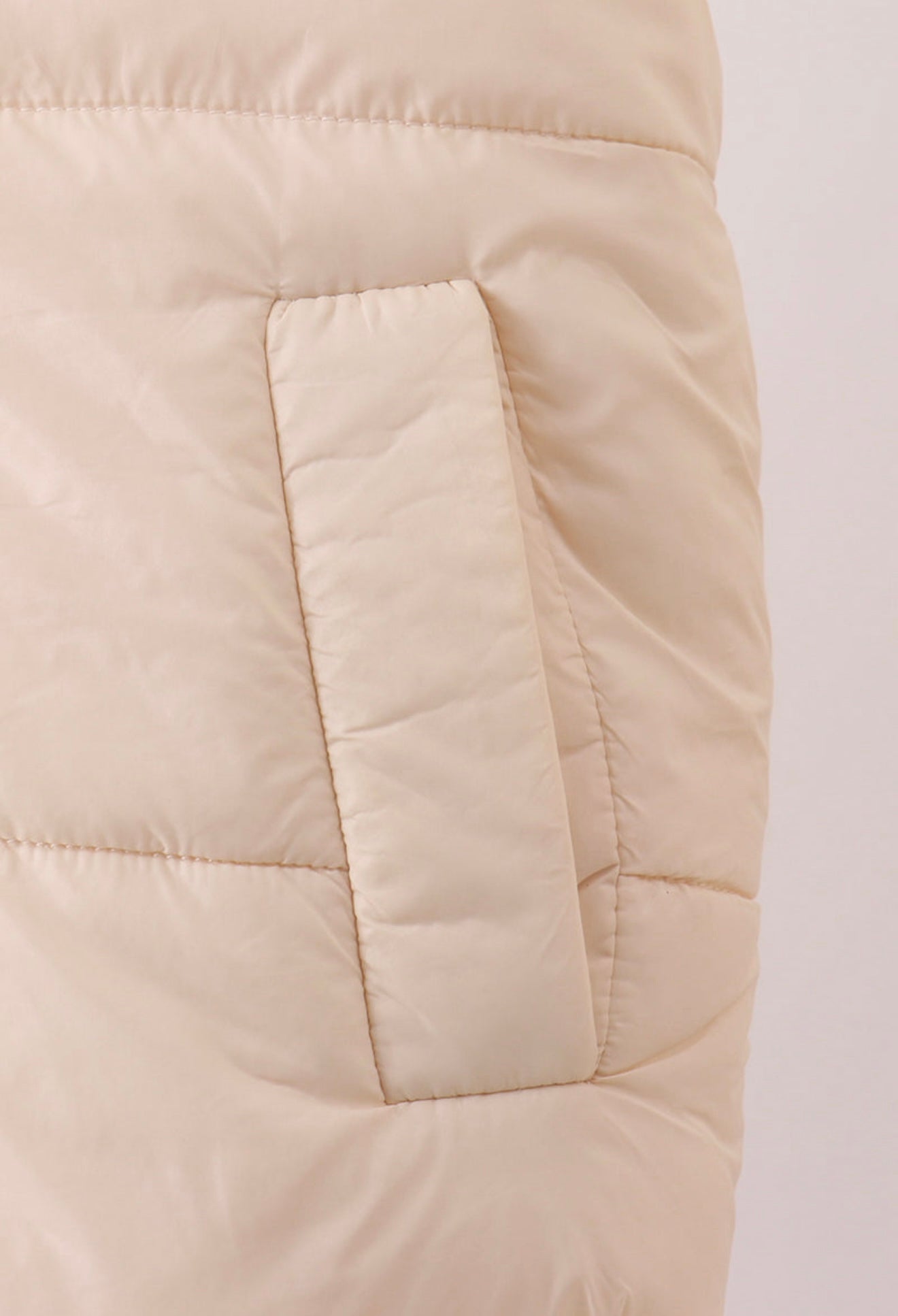 Girl’s cream puffer vest