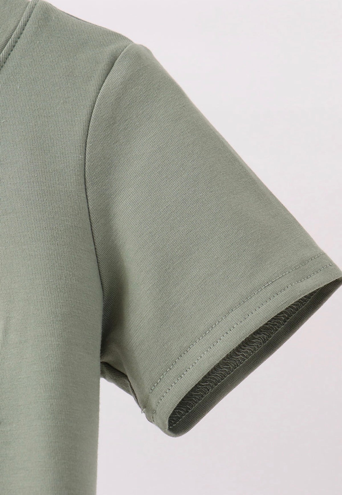 Green pumpkin french knot top