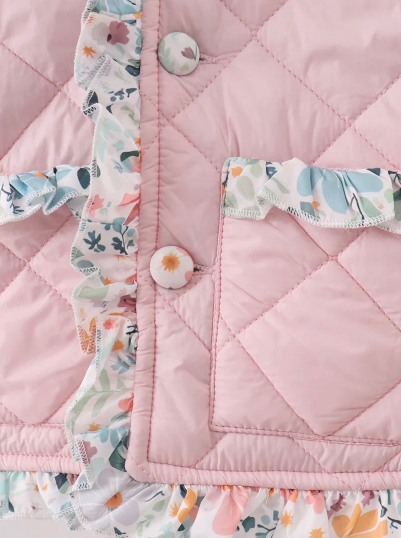 Girl’s pink floral ruffle quilted jacket