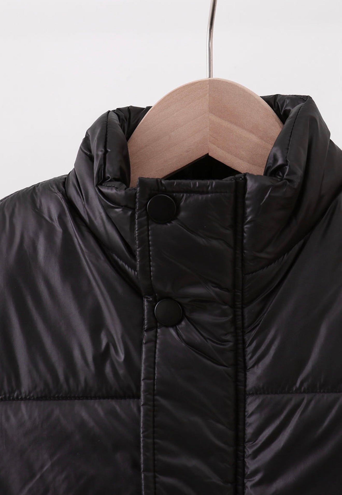 Girl’s black puffer vest