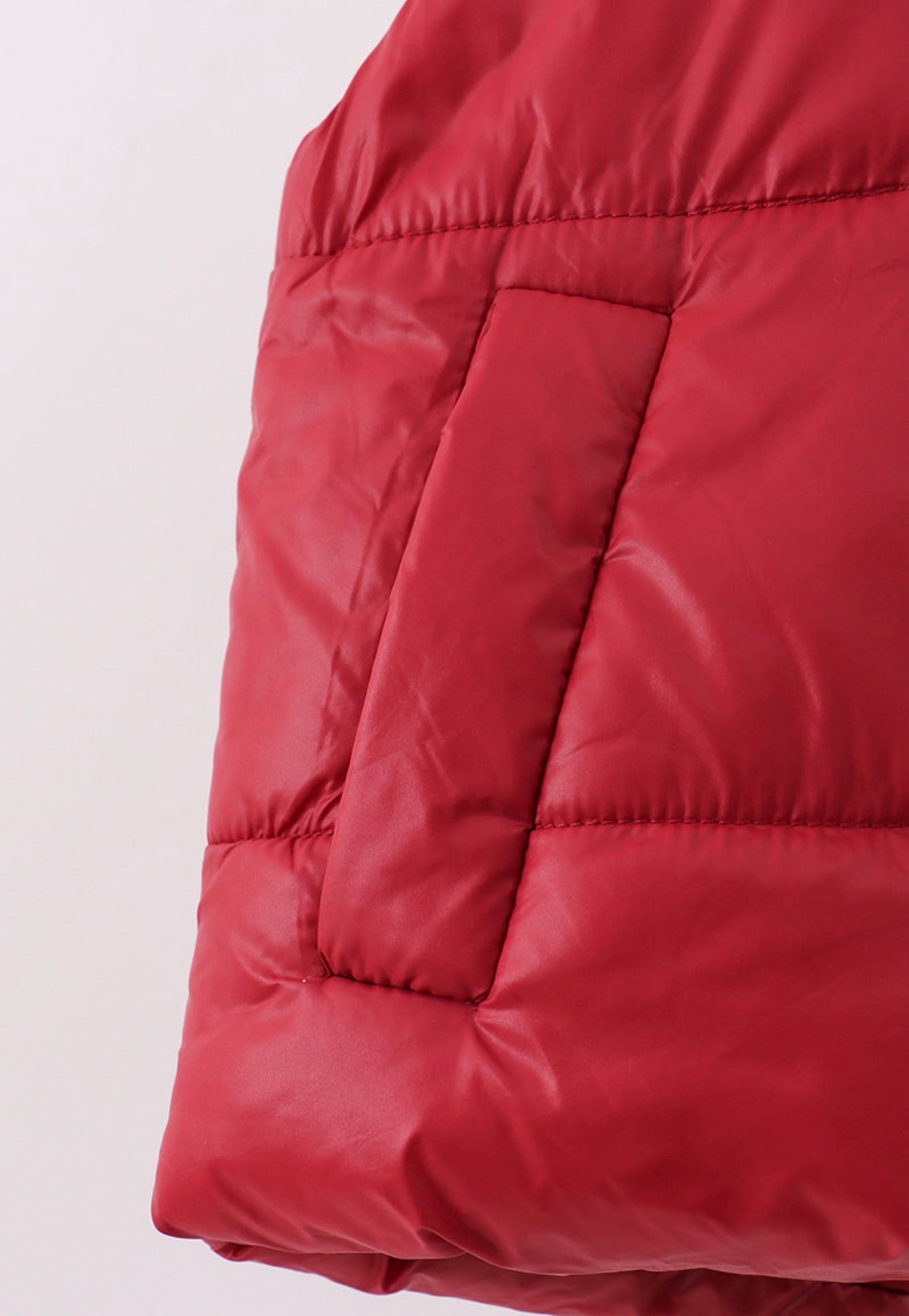 Girl’s maroon puffer vest