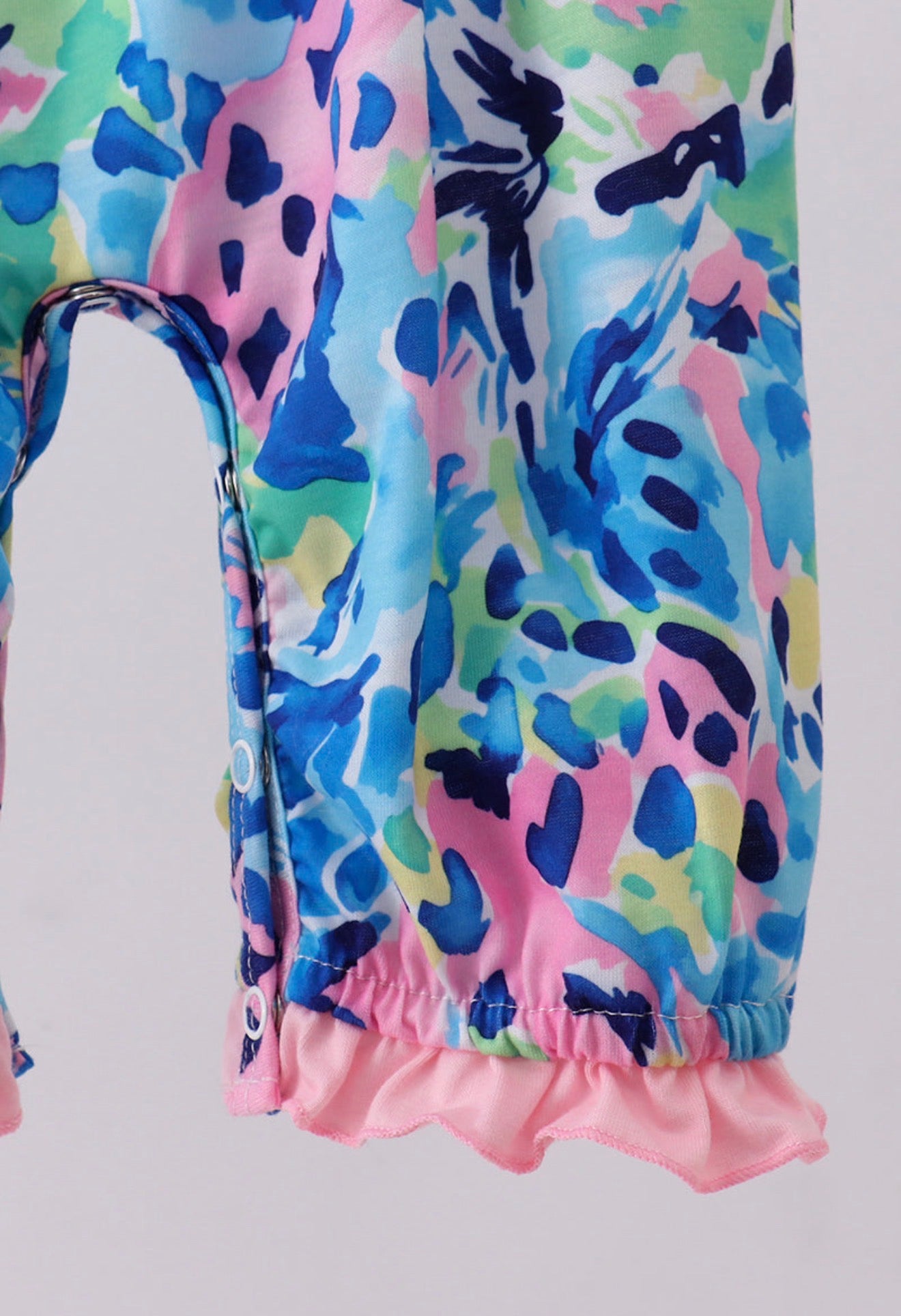 Pink character smocked ruffle romper