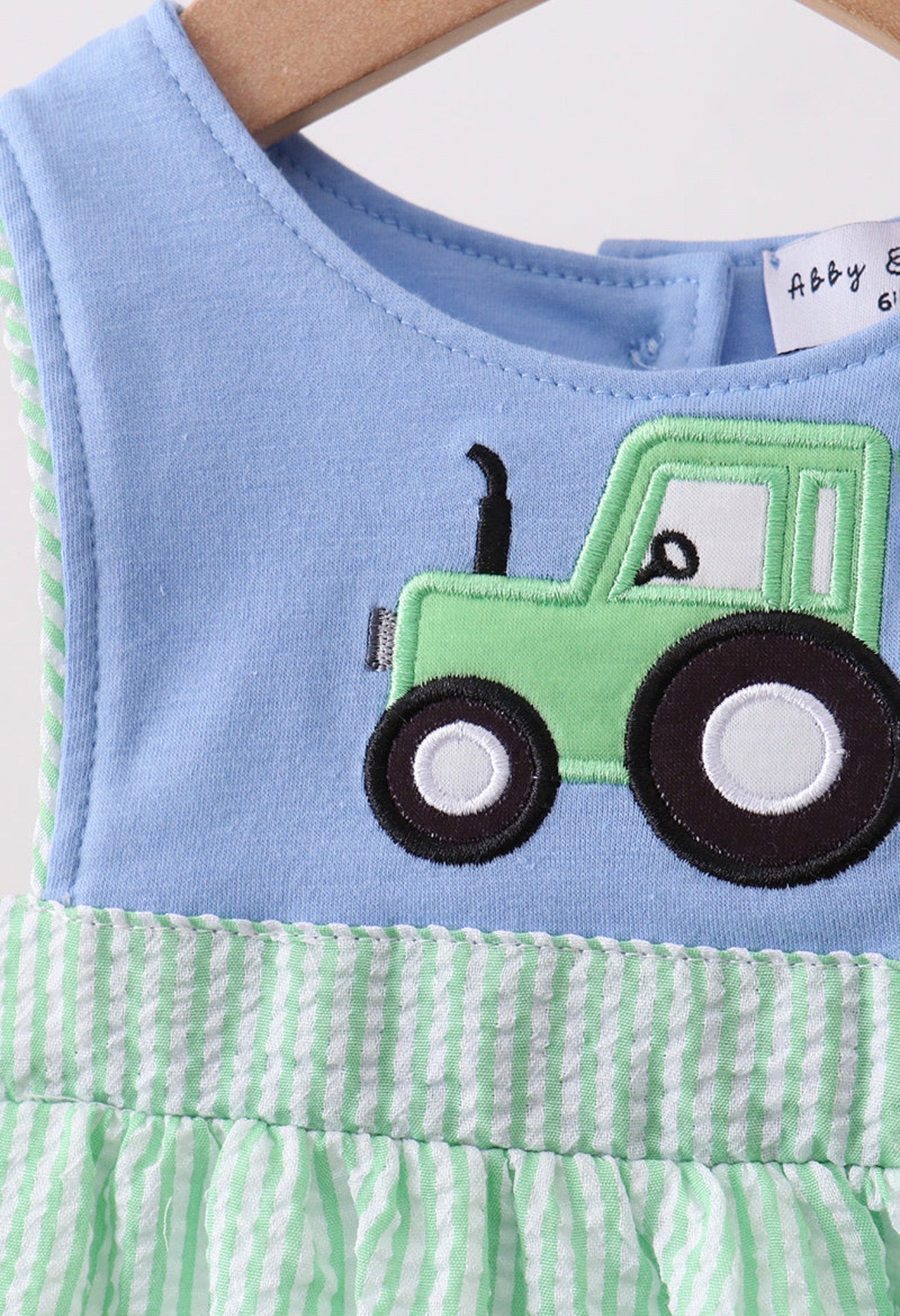 Blue tractor appliqué seersucker bubble