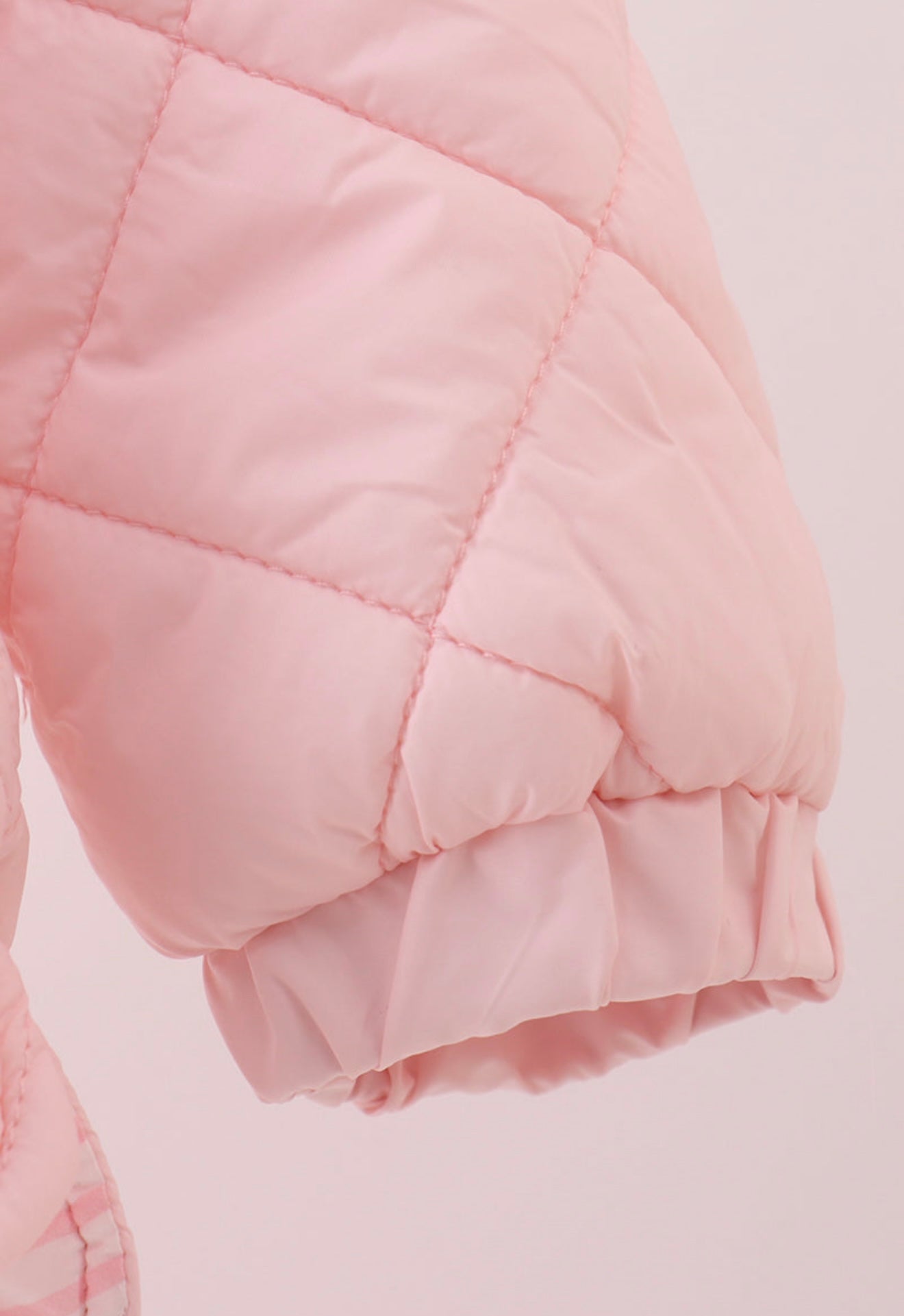 Girl’s pink quilted jacket