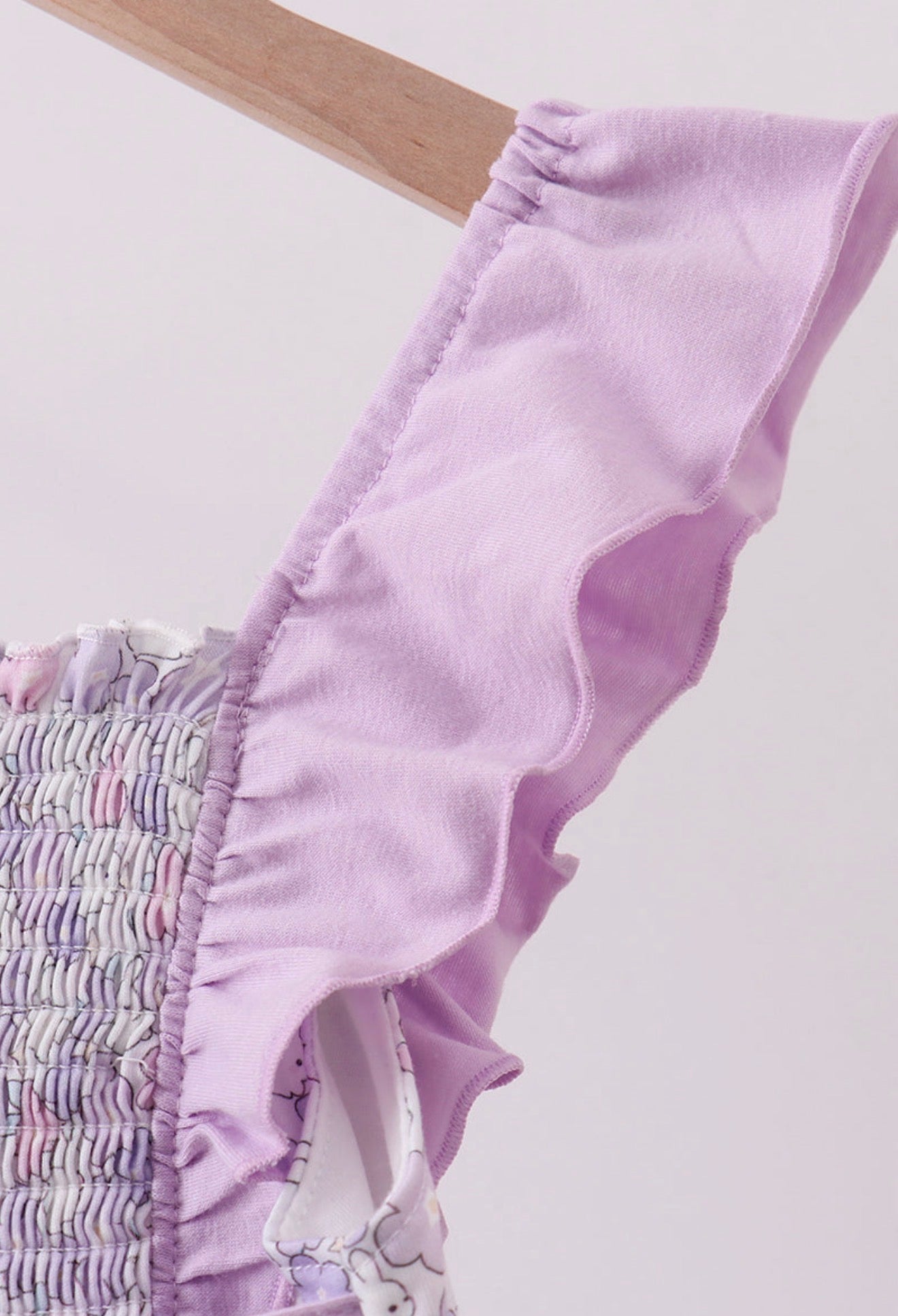 Purple Floral Smocked
Ruffle Jumpsuit