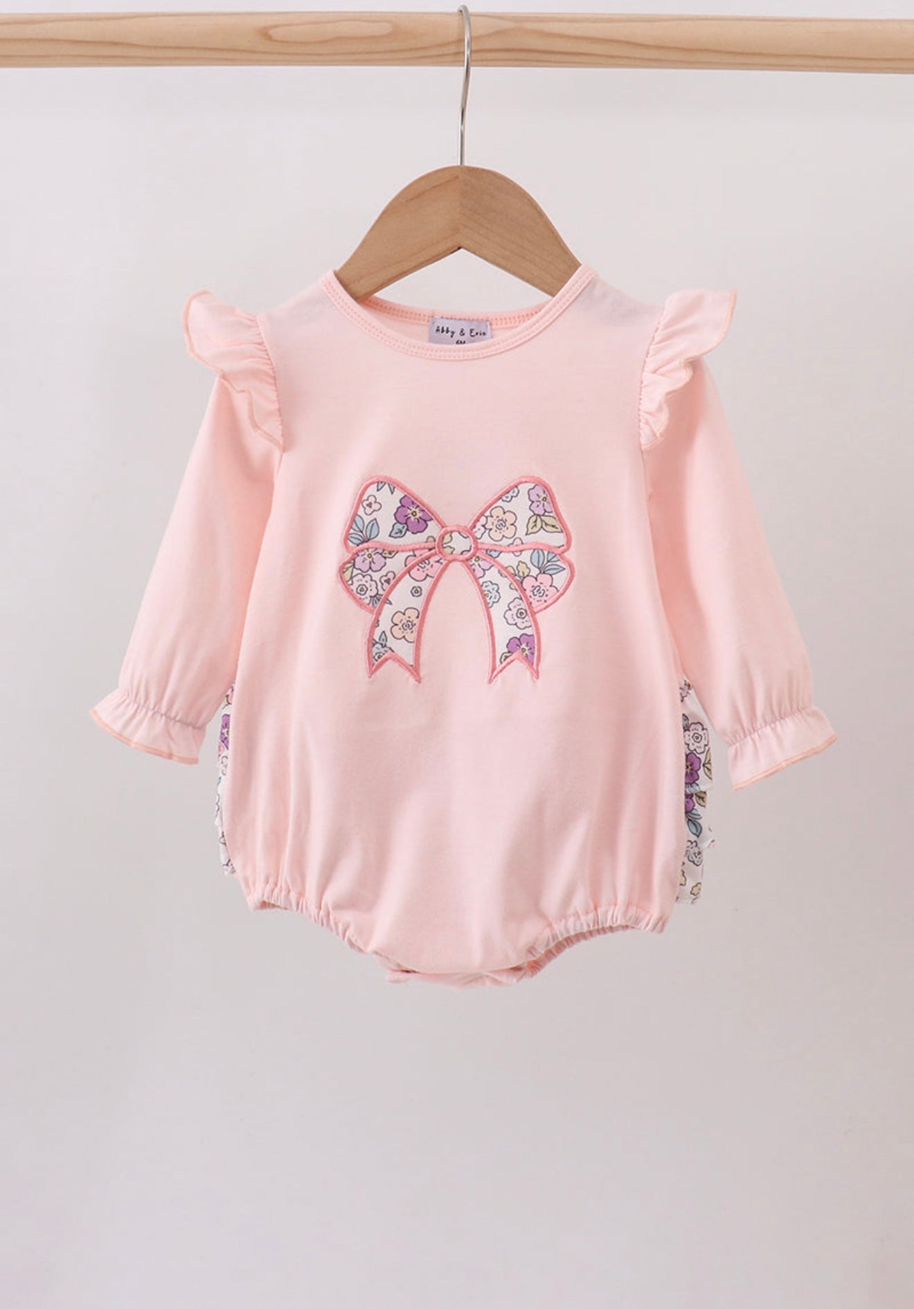 Pink floral bow appliqué ruffle bubble