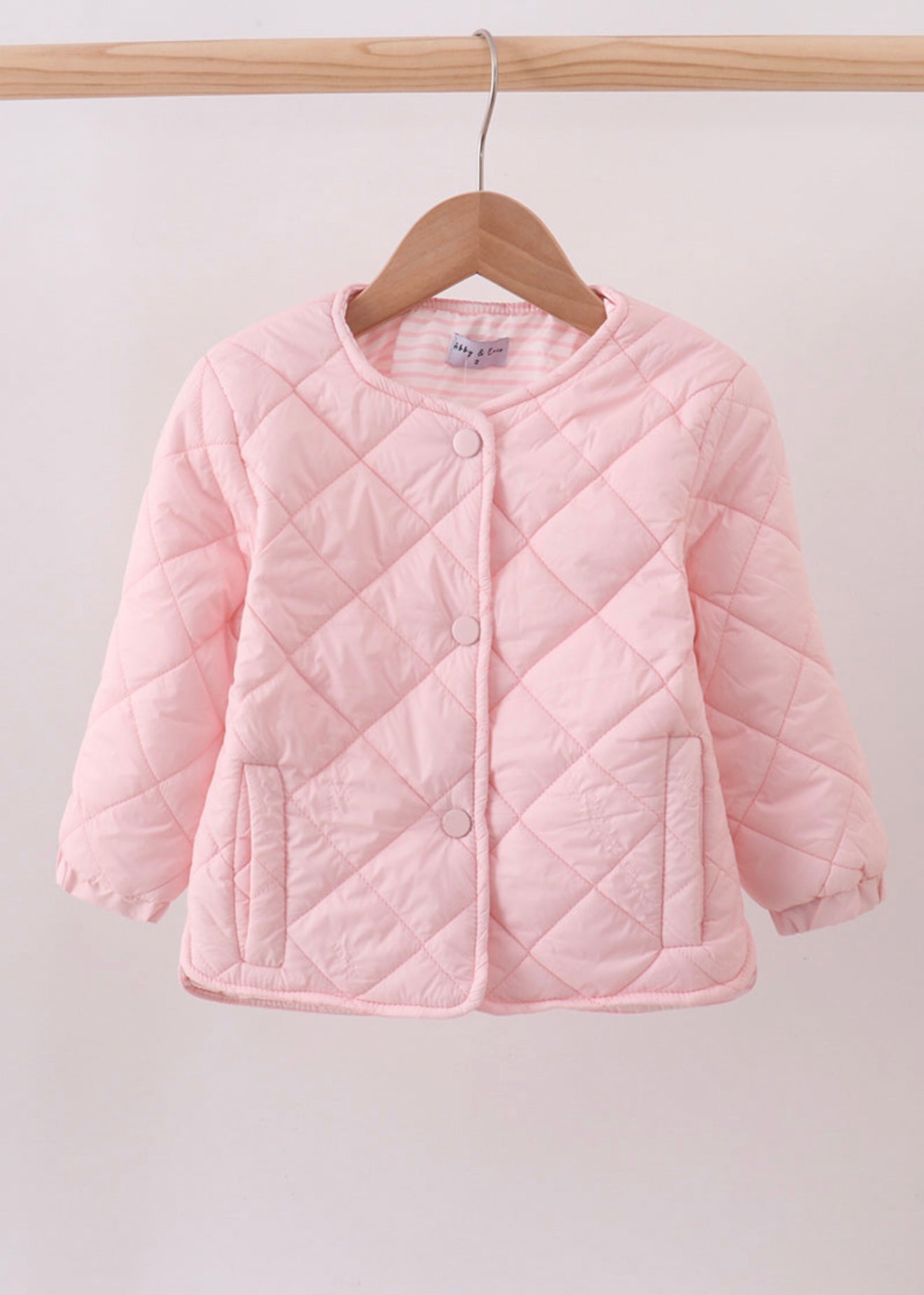 Girl’s pink quilted jacket