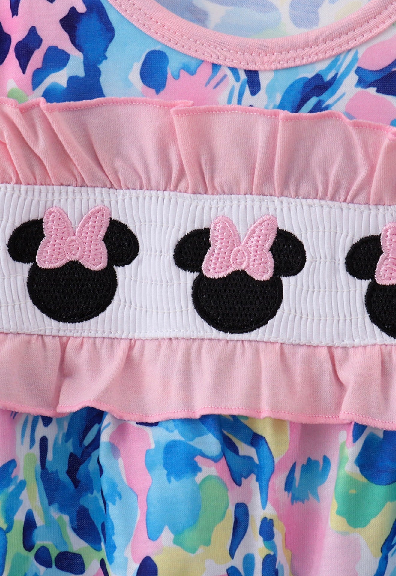 Pink character smocked ruffle romper