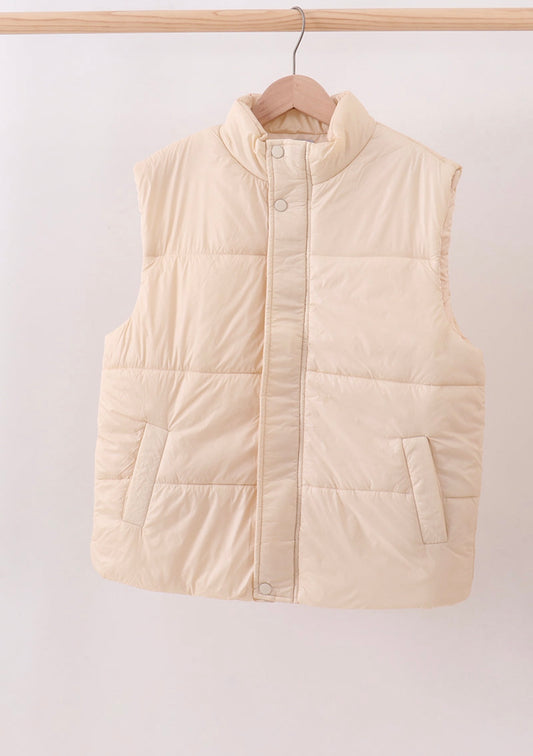 Girl’s cream puffer vest
